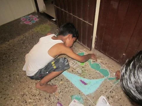 Diwali rangoli making Stock Photos