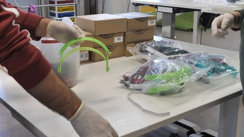 DIY 3D Printed Masks Being Put Together For The First Time Stock Footage 127711328