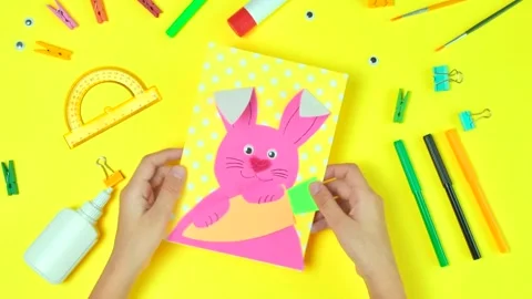 DIY and kids creativity. Step by step instruction: Create an Easter card Stock Footage 147554082