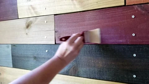 DIY Applying Polyurethane Over Stained Wood Stock Footage 197493130
