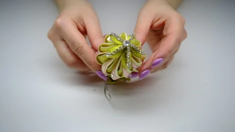 DIY. Christmas tree decorations made using the kanzashi technique Stock Footage 145483150