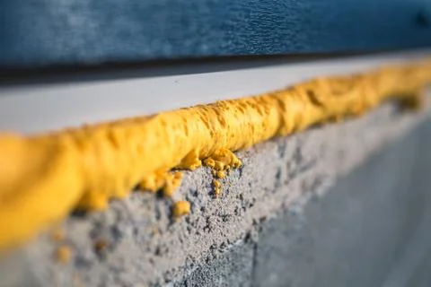 DIY concept. Construction PU - poly urethane foam. The window is installed using Stock Photos