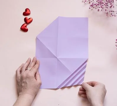 DIY concept. Step 10. Step-by-step photo instructions. A postcard with a flow Stock Photos