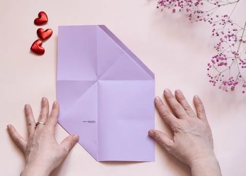 DIY concept. Step 11. Step-by-step photo instructions. A postcard with a flow Stock Photos