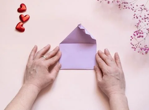 DIY concept. Step 13. Step-by-step photo instructions. A postcard with a flow Stock Photos