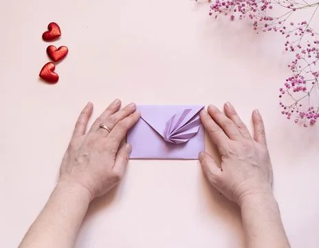 DIY concept. Step 14. Step-by-step photo instructions. A postcard with a flow Stock Photos