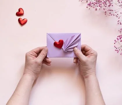 DIY concept. Step 15. Step-by-step photo instructions. A postcard with a flow Stock Photos