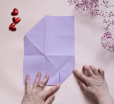 DIY concept. Step 8. Step-by-step photo instructions. A postcard with a flowe Stock Photos
