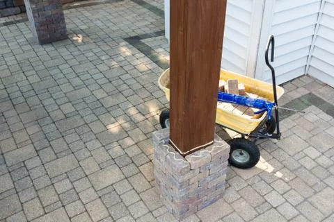 DIY construction of a brick pillar Stock Photos