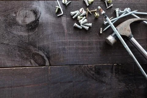 DIY construction tools on dark wood Stock Photos