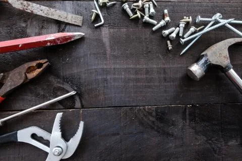 DIY construction tools on dark wood Stock Photos