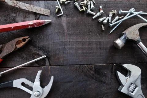DIY construction tools on dark wood Stock Photos
