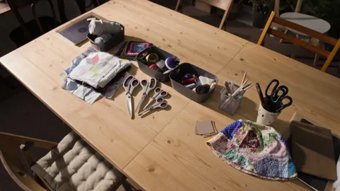 DIY Craft Supplies with Sewing Tools Arranged on Workspace Stock Footage 341940315