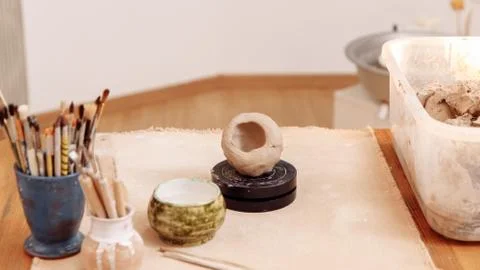 DIY create a Cup of clay by hand modeling. Step 3. The formation of the Cup Stock Photos