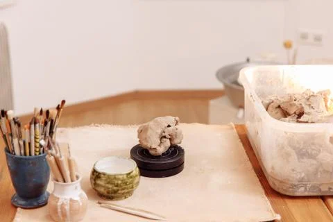 DIY Creating a Cup from clay by hand molding. Step 1. Take the clay Stock Photos