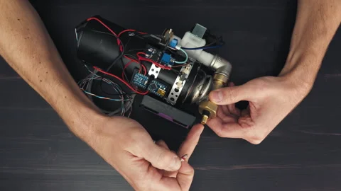 DIY Device Assembly: Connecting Valve Video stock 247196138