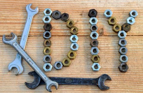 Diy (do it yourself) text from small nuts and spanners Stock Photos