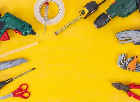 DIY Do it yourself tools on yellow background. DIY tools with copy space for  Stock Photos