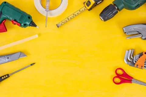 DIY Do it yourself tools on yellow background. DIY tools with copy space for  Stock Photos