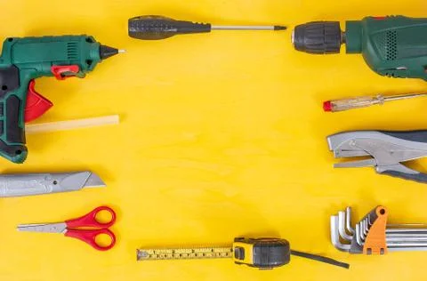 DIY Do it yourself tools on yellow background. DIY tools with copy space for  Stock Photos