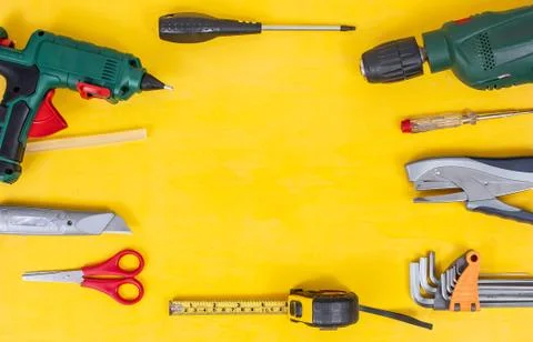 DIY Do it yourself tools on yellow background. DIY tools with copy space for  Stock Photos