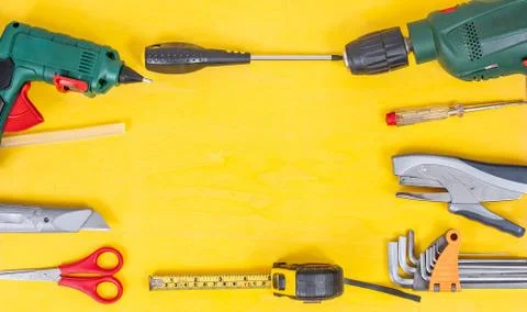 DIY Do it yourself tools on yellow background. DIY tools with copy space for  Stock Photos