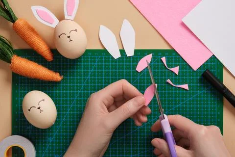 DIY Easter Bunny Egg Craft. Step-by-step instructions. Step 4. Cut out the .. Stock Photos