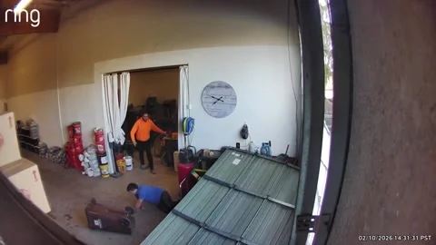 DIY Fail Fixing Garage Door, Gresham, Oregon, USA - 10 Feb 2026 Stock Footage 328737836