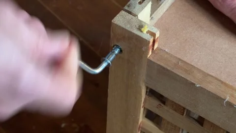 DIY Flatpack table being unsrewed Stock Footage 328230626