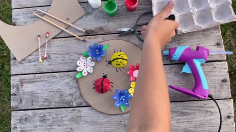 DIY flowers and lady bug from recycling egg boxes. Zero waste concept. Stock Footage 247915249