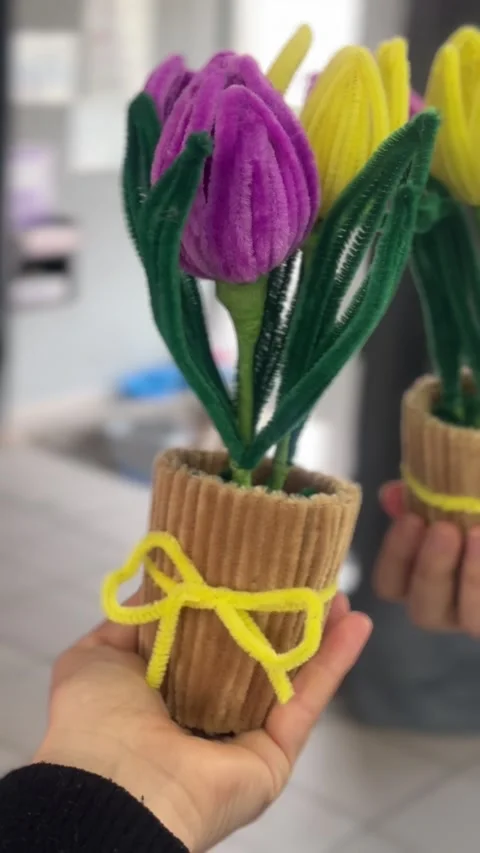 DIY Fluffy Tulips in a Pot: Chenille Stems Flower Review Stock Footage 332847421