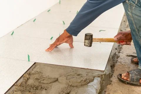 Diy guide indoor floor tiling installation process for home improvement con.. Stock Photos