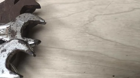 DIY hardware tools over plank wood surface with free copy space. Great for .. Stock Photos