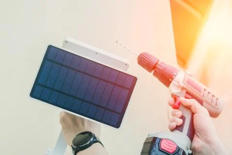 DIY installing replace solar panel night lamp for save money no electricity c Foto stock