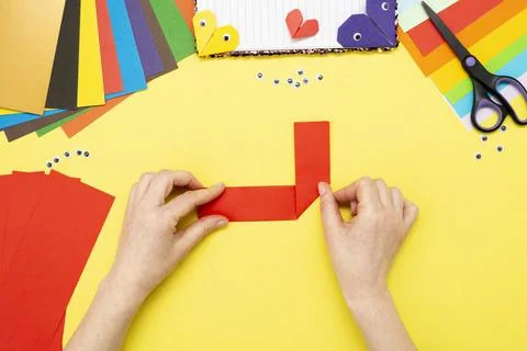 DIY instruction. Step by step guide. The process of making a bookmark for a b Stock Photos