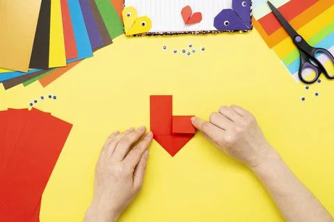 DIY instruction. Step by step guide. The process of making a bookmark for a b Stock Photos