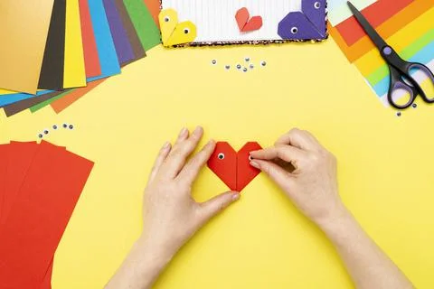 DIY instruction. Step by step guide. The process of making a bookmark for a b Stock Photos