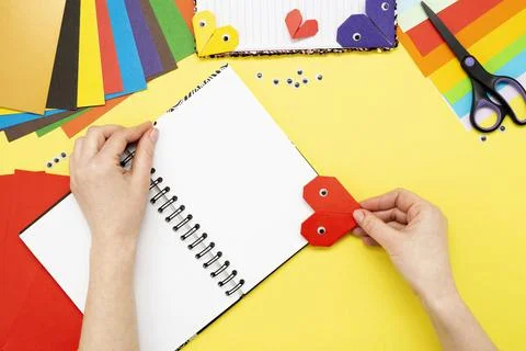 DIY instruction. Step by step guide. The process of making a bookmark for a b Stock Photos