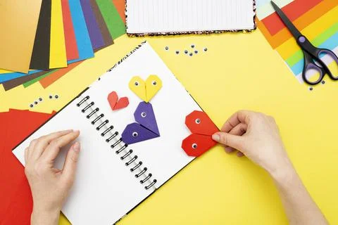 DIY instruction. Step by step guide. The process of making a bookmark for a b Stock Photos