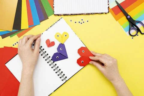 DIY instruction. Step by step guide. The process of making a bookmark for a b Stock Photos