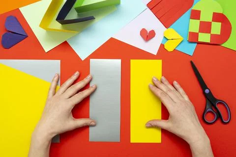 DIY instruction. Step by step guide. The process of making a paper heart from Stock Photos