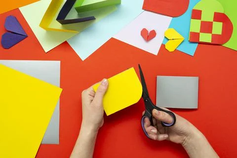 DIY instruction. Step by step guide. The process of making a paper heart from Stock Photos