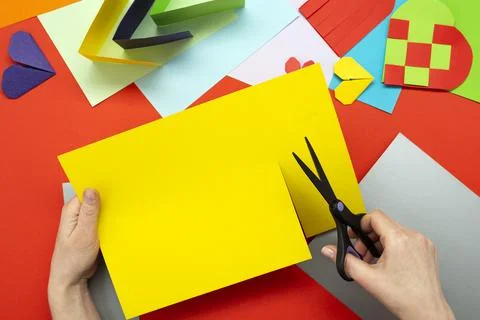 DIY instruction. Step by step guide. The process of making a paper heart from Stock Photos