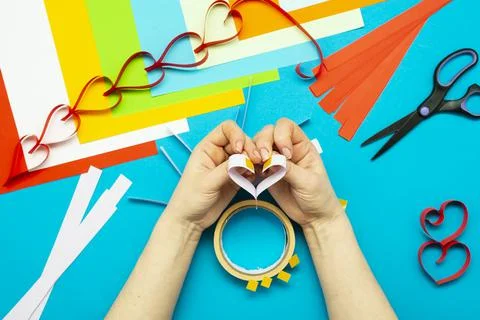 DIY instruction. Step by step guide. The process of making a garland of heart Stock Photos