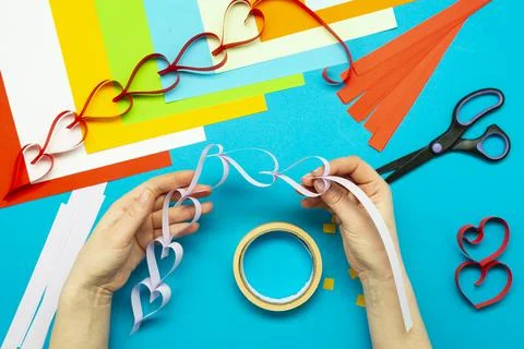 DIY instruction. Step by step guide. The process of making a garland of heart Stock Photos