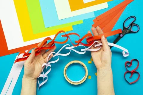 DIY instruction. Step by step guide. The process of making a garland of heart Stock Photos