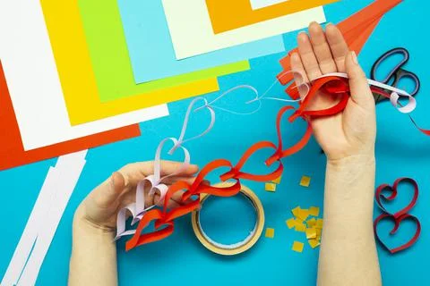 DIY instruction. Step by step guide. The process of making a garland of heart Stock Photos