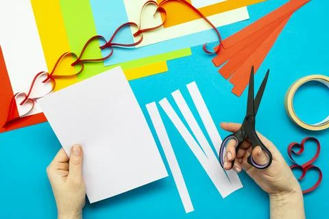 DIY instruction. Step by step guide. The process of making a garland of heart Stock Photos