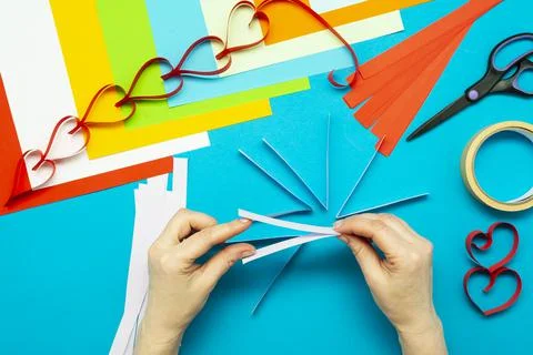 DIY instruction. Step by step guide. The process of making a garland of heart Stock Photos