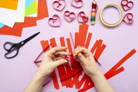 DIY instruction. Step by step guide. The process of making a garland of heart Stock Photos